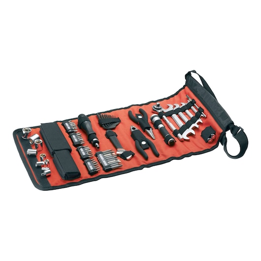 A BLACK+DECKER tool kit displayed in an open roll-up case with various hand tools including pliers, wrenches, screwdrivers, socket attachments, and bits organized on a red background.