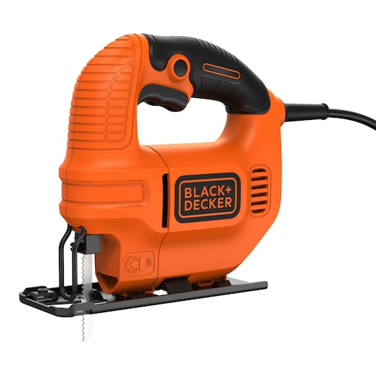 A BLACK+DECKER KS501 electric jigsaw with an orange and black design. The tool is shown from the side, displaying its handle, blade, and power cord.