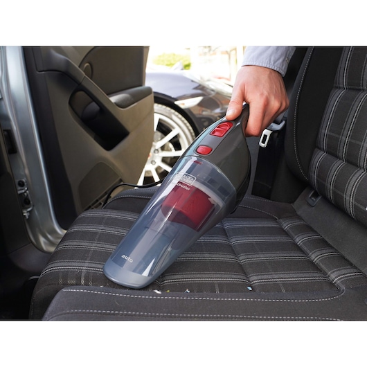 BLACKDECKER NV1210AV handheld vacuum cleaning car seat upholstery.