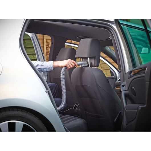 BLACKDECKER NV1210AV hand vacuum cleaning car interior seat with flexible hose.